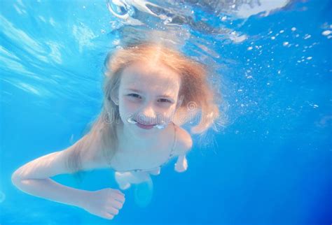 female nude swimming|nude.